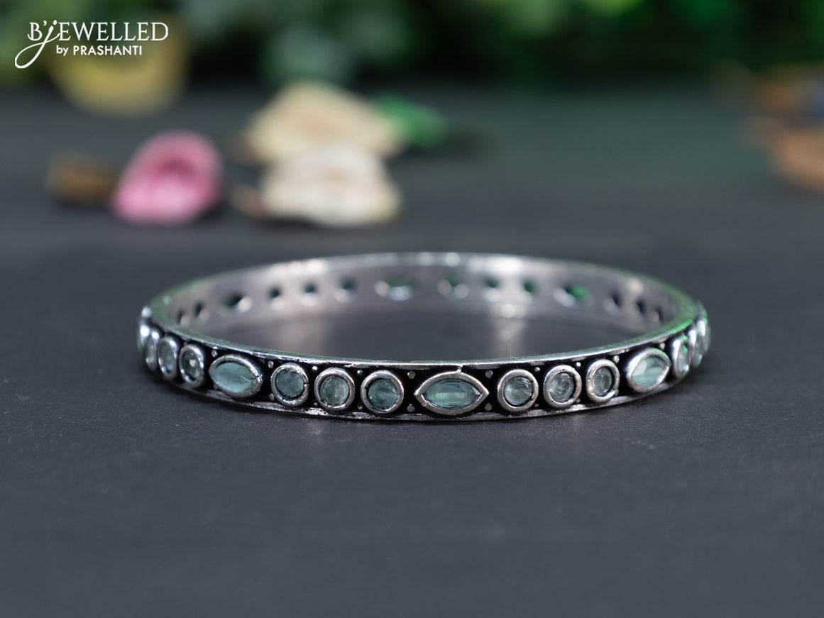 Oxidised bangle with mint green stones