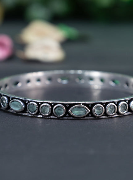 Oxidised bangle with mint green stones