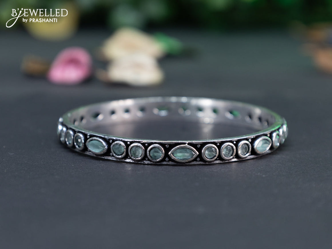 Oxidised bangle with mint green stones