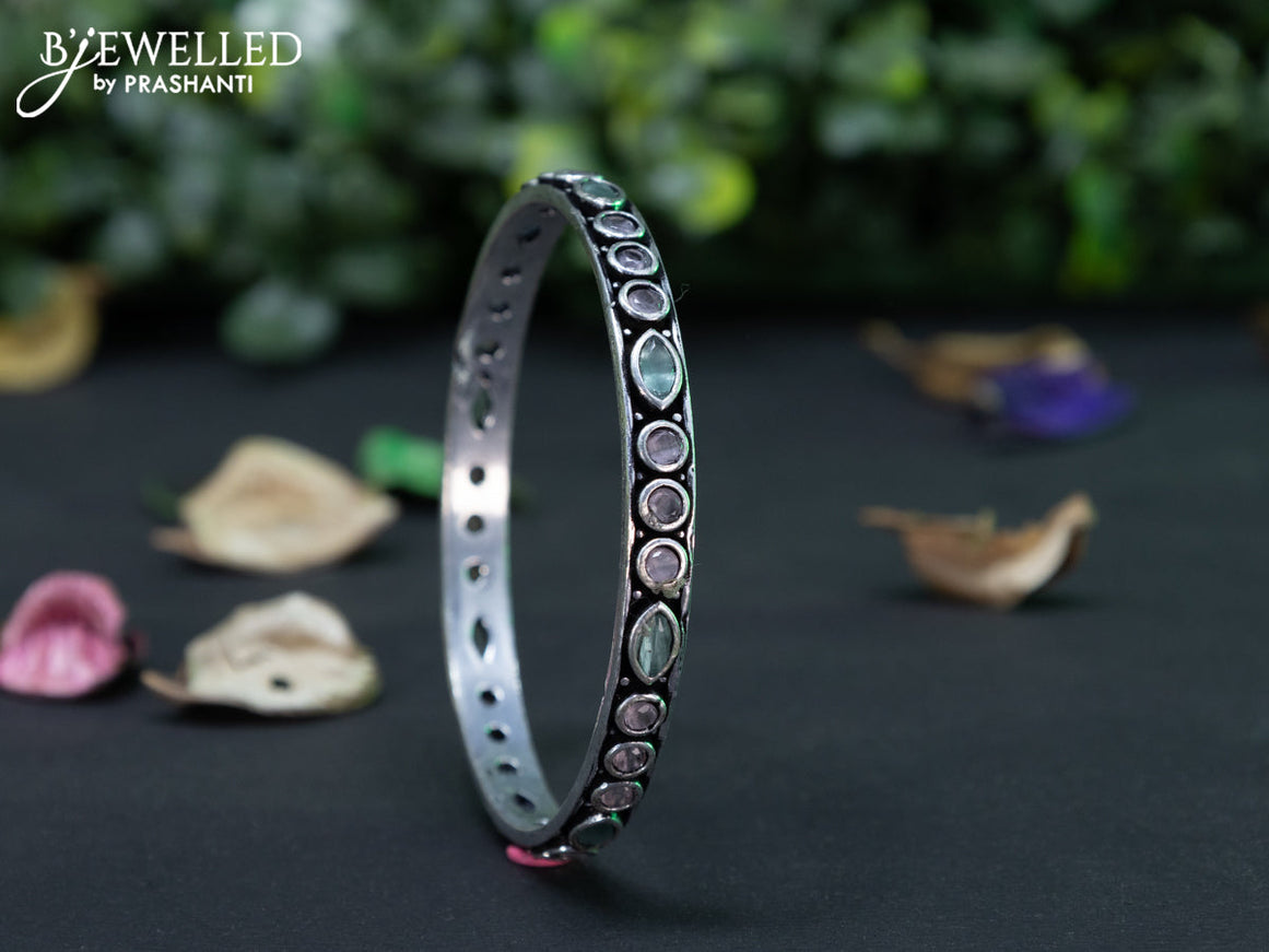 Oxidised bangle with mint green and baby pink stones