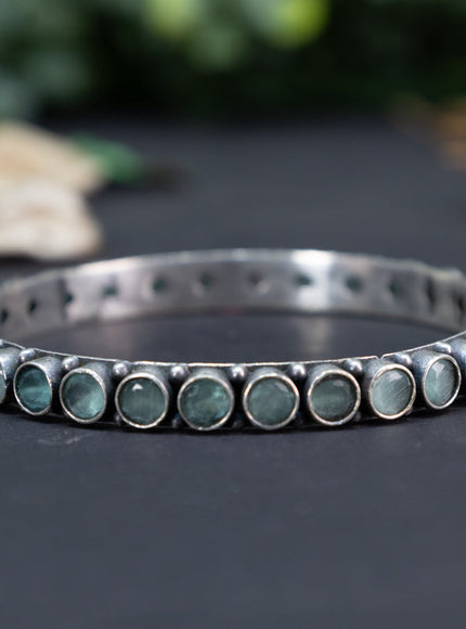 Oxidised bangle with mint green stones