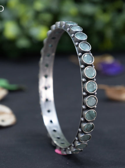 Oxidised bangle with mint green stones