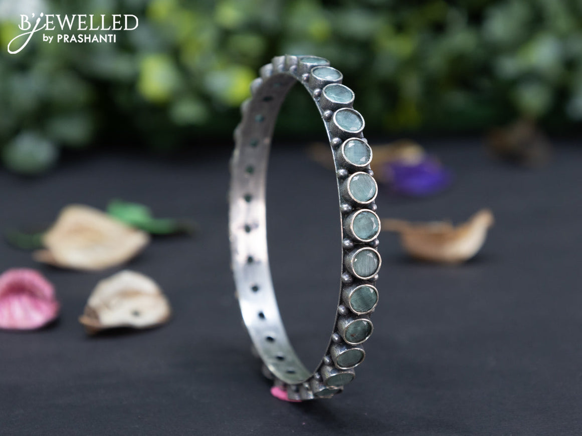 Oxidised bangle with mint green stones