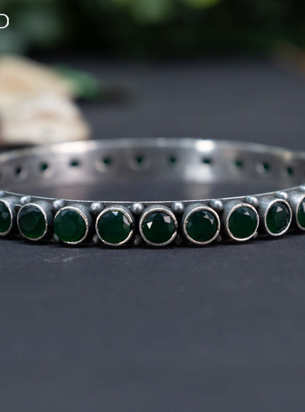 Oxidised bangle with emerald stones