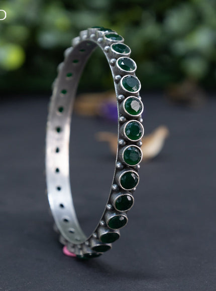 Oxidised bangle with emerald stones