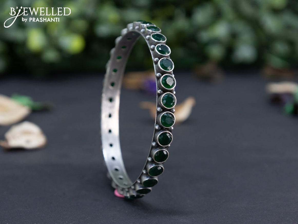 Oxidised bangle with emerald stones