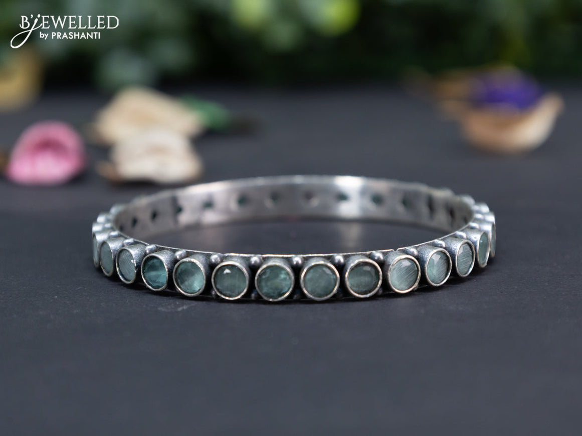 Oxidised bangle with mint green stones