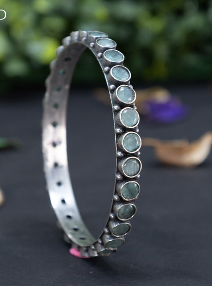 Oxidised bangle with mint green stones