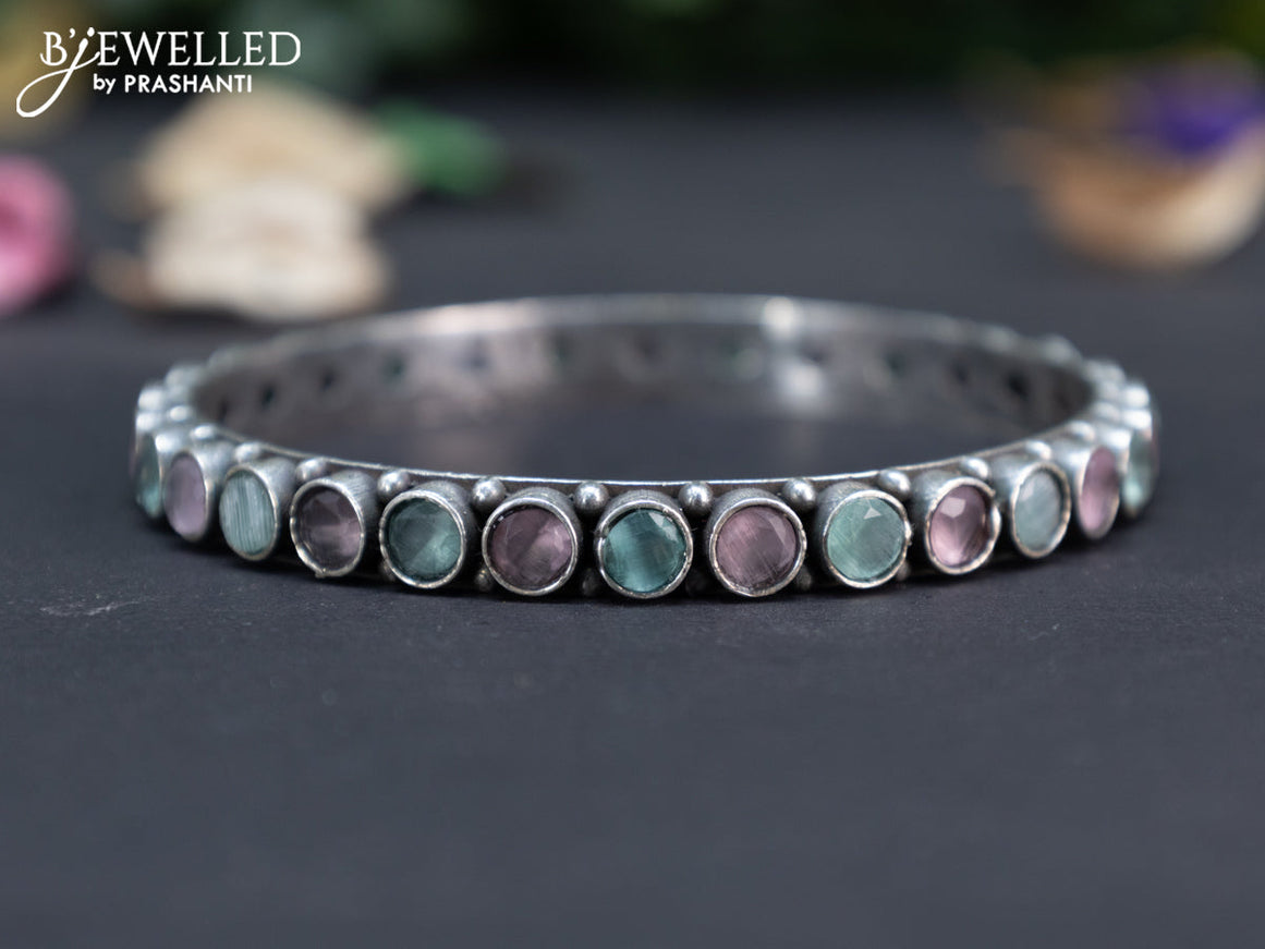 Oxidised bangle with mint green and baby pink stones