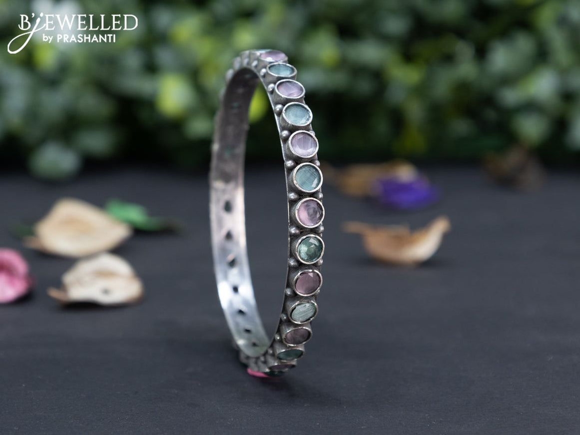 Oxidised bangle with mint green and baby pink stones