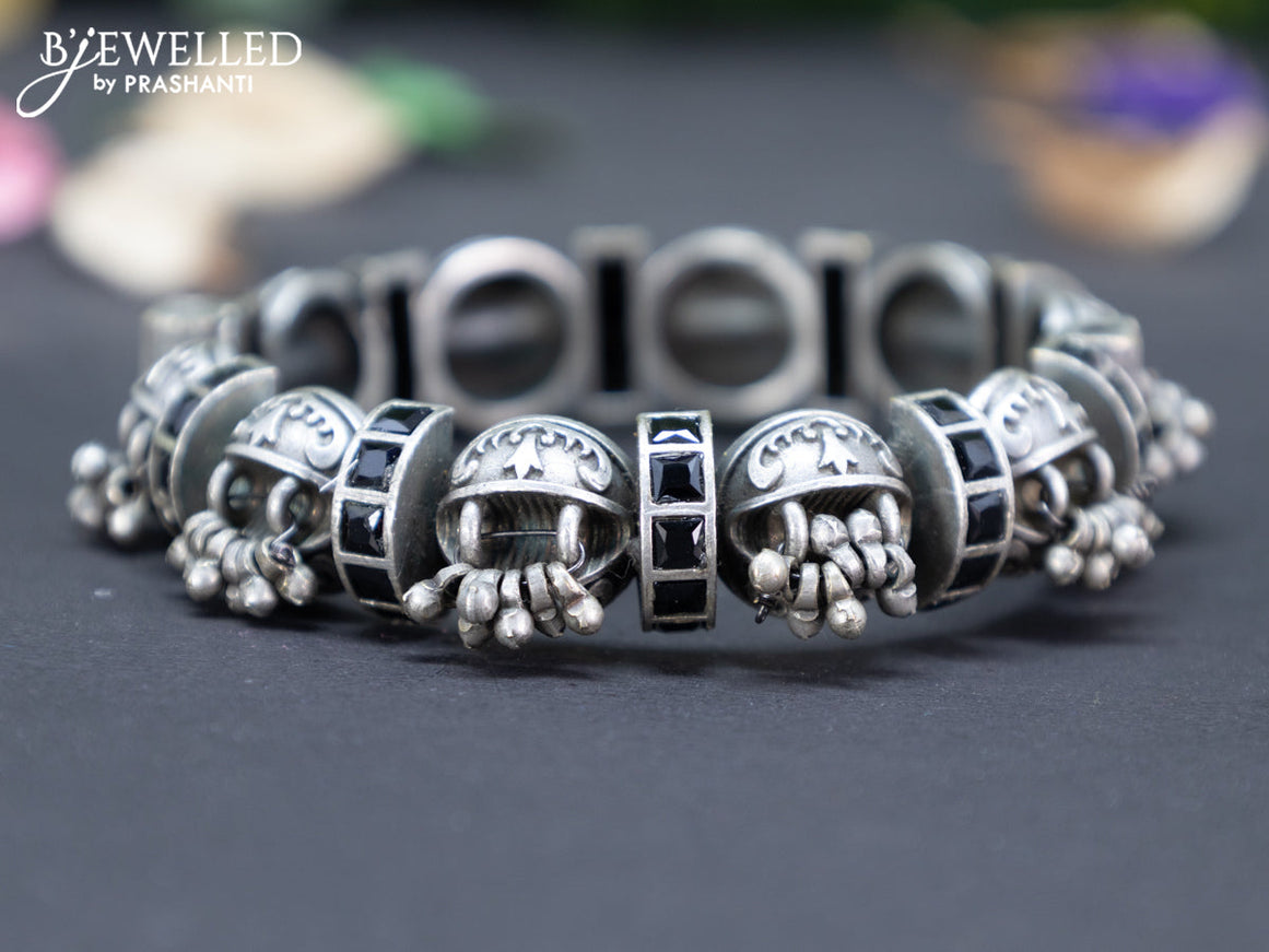 Oxidised screw type bangle with black stones and hanging