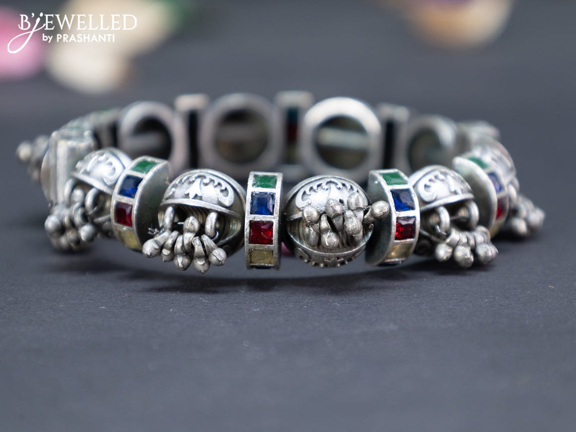 Oxidised screw type bangle with multi colour stones and hanging