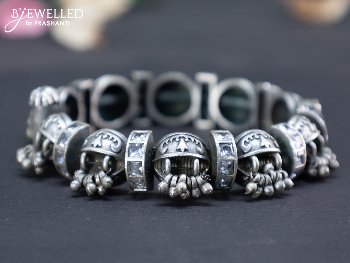 Oxidised screw type bangle with cz stones and hanging