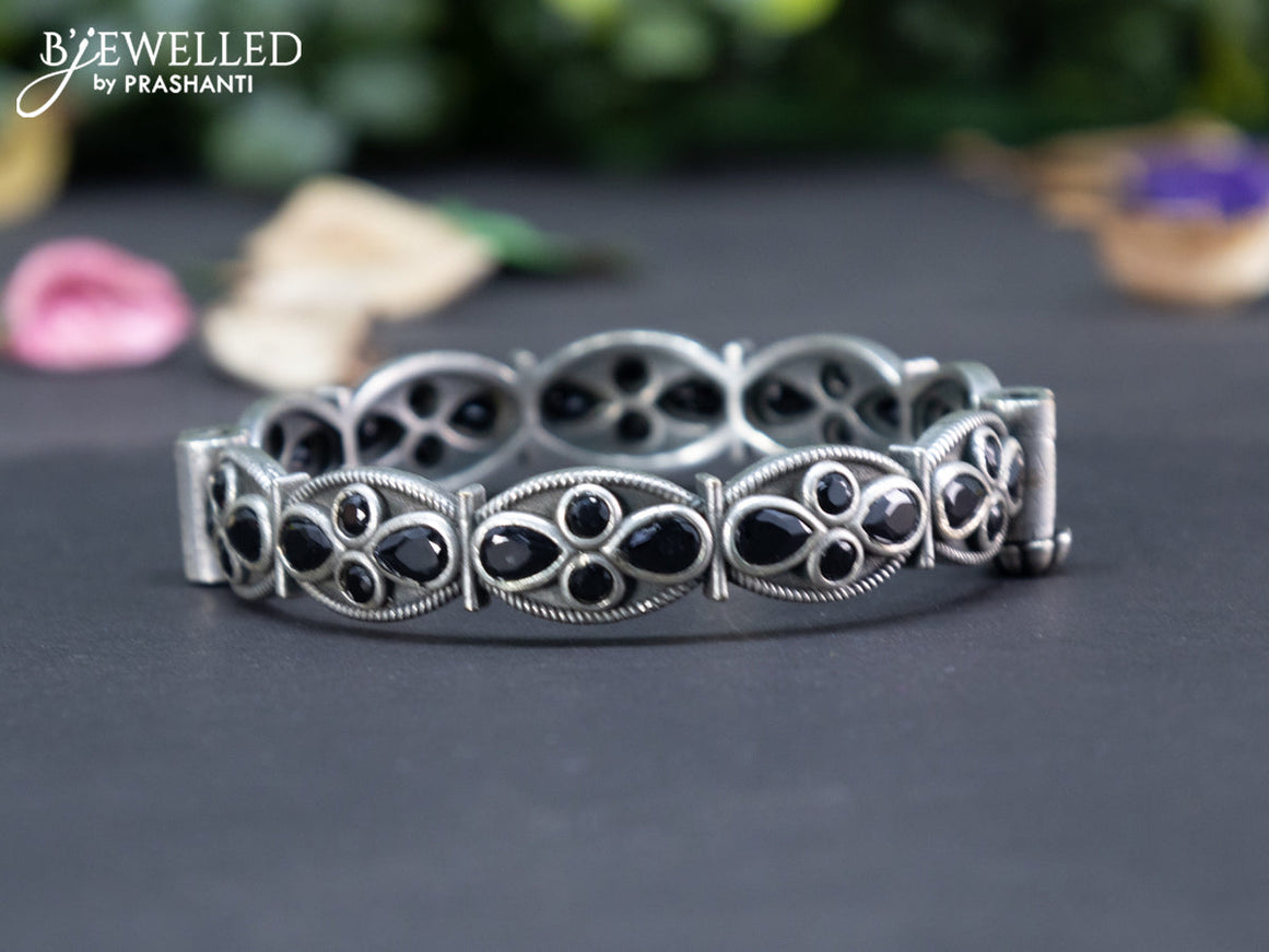 Oxidised screw type bangle with black stones