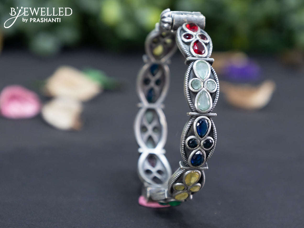 Oxidised screw type bangle with multi colour stones