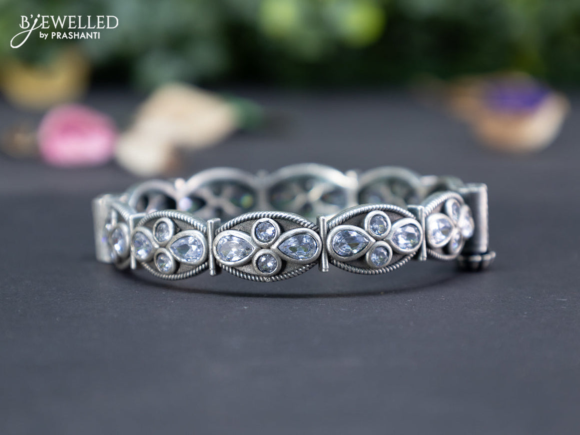 Oxidised screw type bangle with cz stones