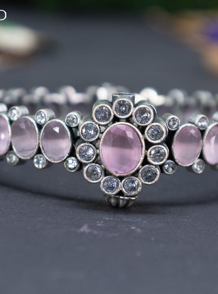 Oxidised screw type bangle with baby pink and cz stones