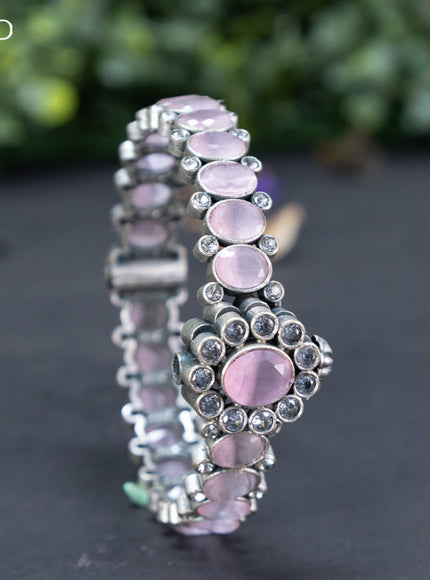 Oxidised screw type bangle with baby pink and cz stones