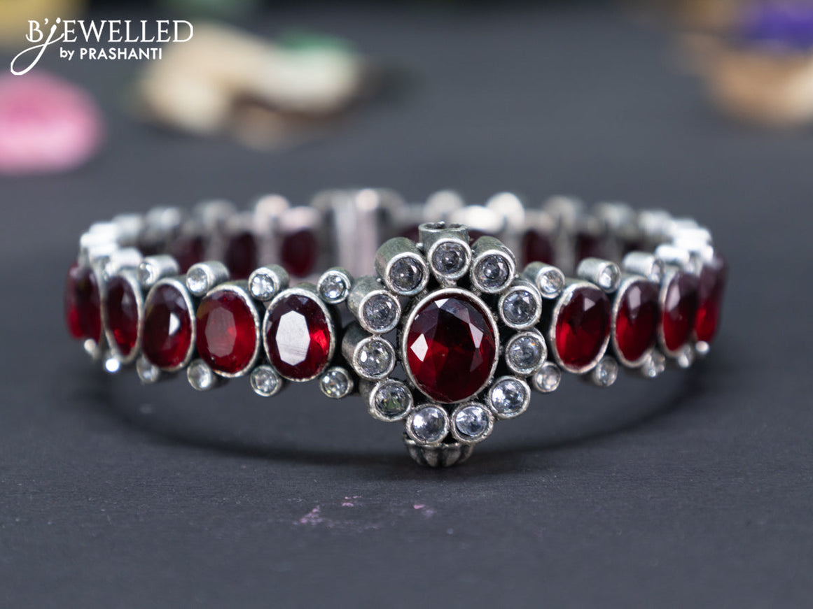 Oxidised screw type bangle with maroon and cz stones