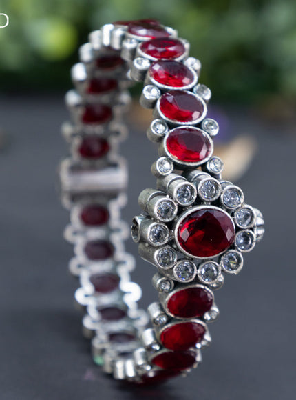 Oxidised screw type bangle with maroon and cz stones