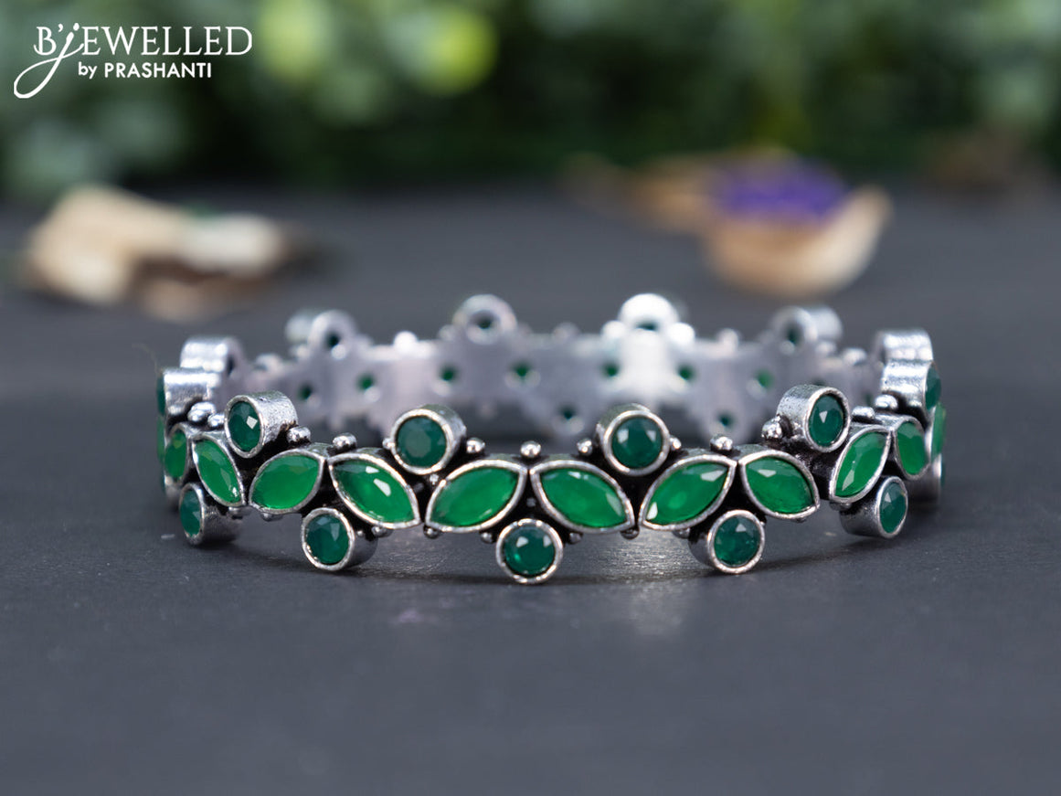 Oxidised bangle with emerald stones