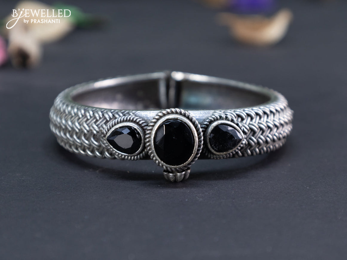 Oxidised screw type bangle with black stones