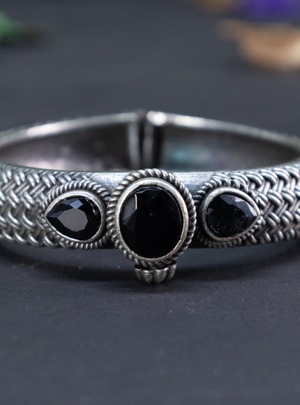 Oxidised screw type bangle with black stones