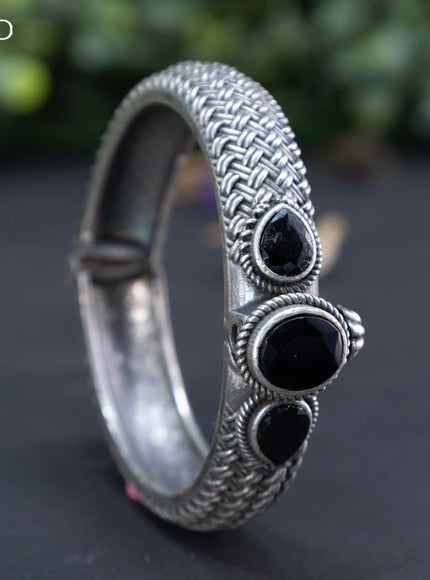 Oxidised screw type bangle with black stones