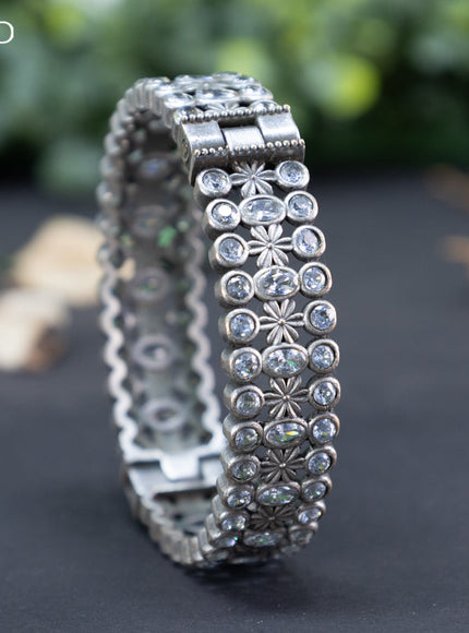 Oxidised screw type bangle with cz stones