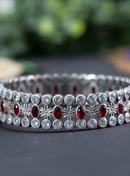 Oxidised screw type bangle with maroon and cz stones