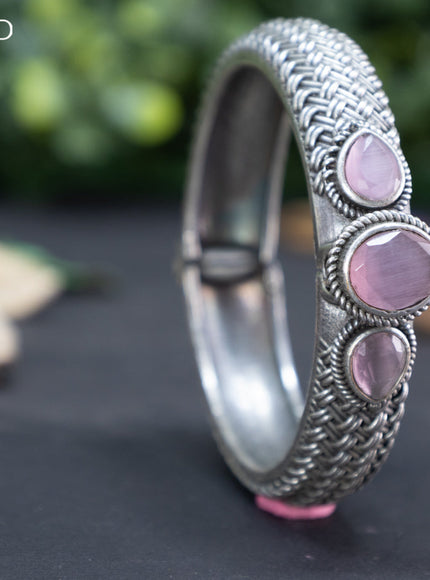 Oxidised screw type bangle with baby pink stones