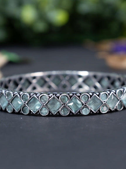 Oxidised bangle with mint green stones