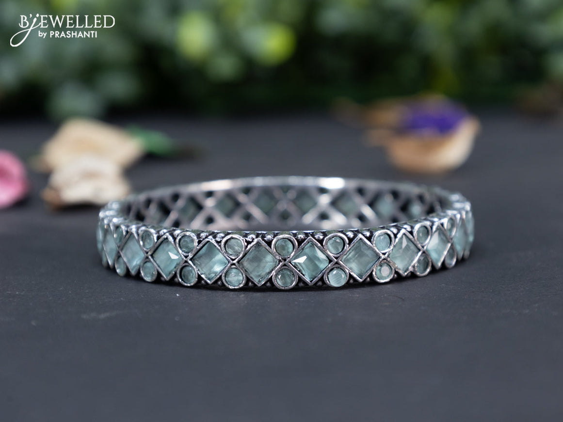 Oxidised bangle with mint green stones