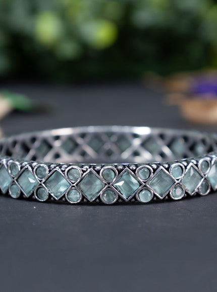 Oxidised bangle with mint green stones