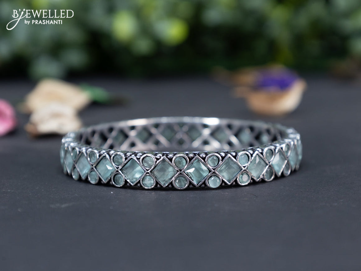 Oxidised bangle with mint green stones