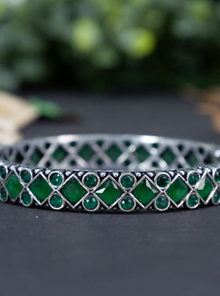 Oxidised bangle with emerald stones