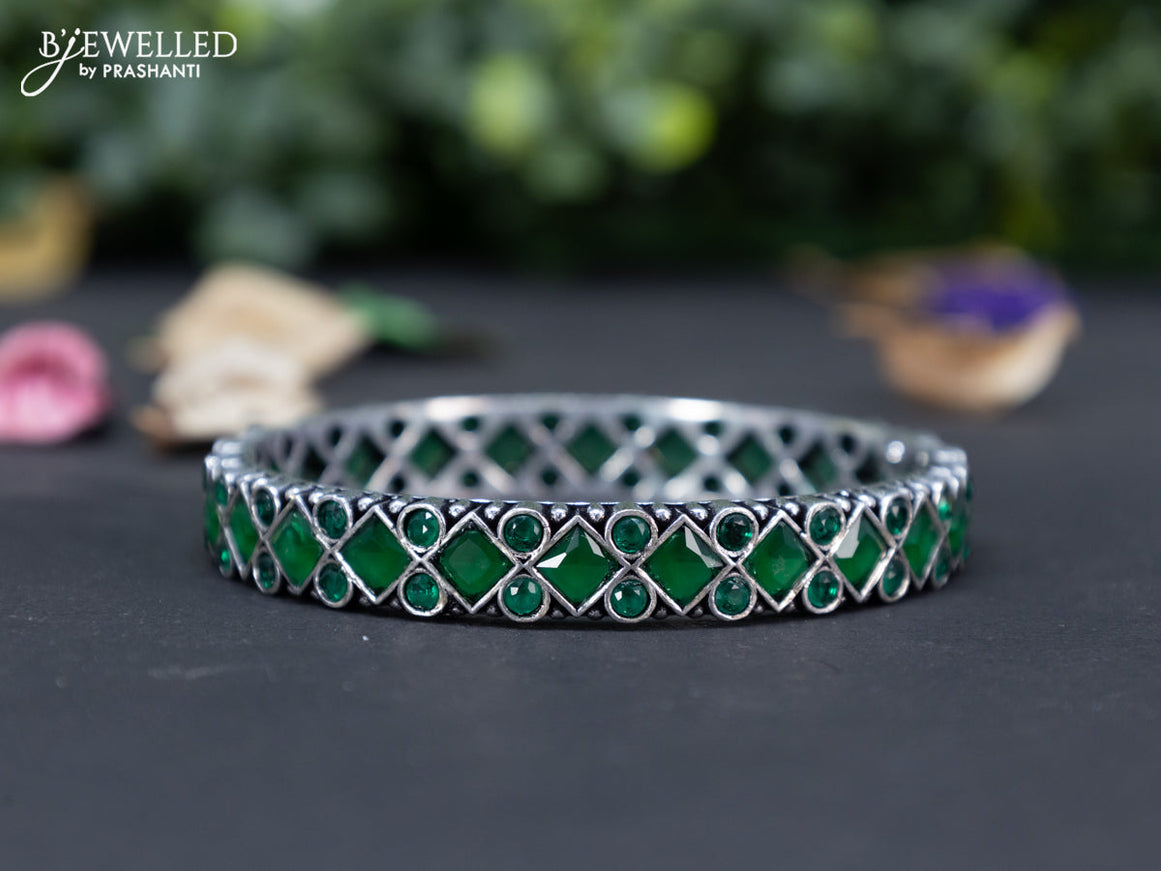 Oxidised bangle with emerald stones