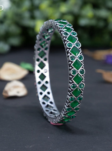 Oxidised bangle with emerald stones