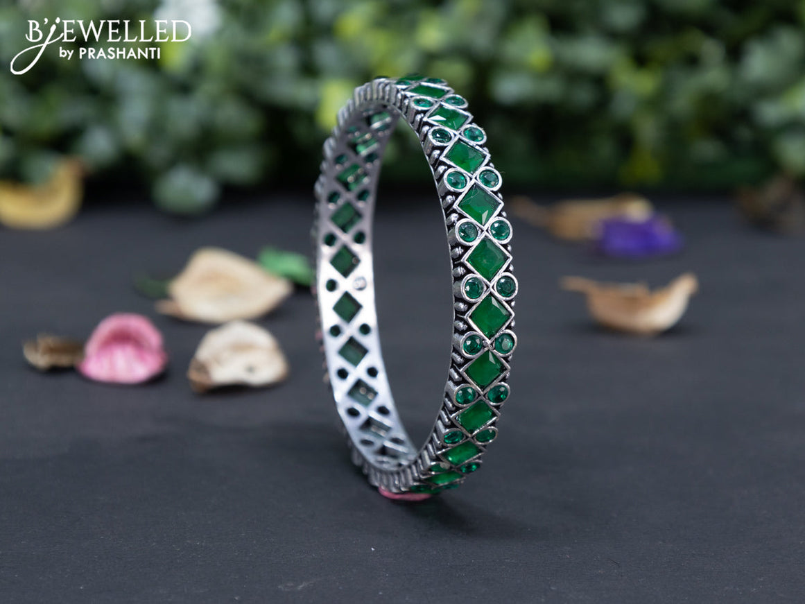 Oxidised bangle with emerald stones