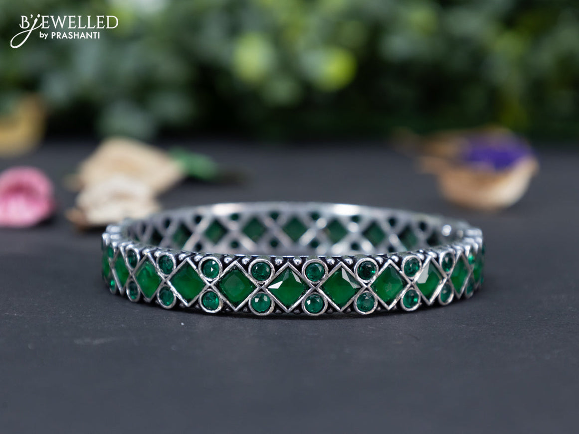 Oxidised bangle with emerald stones