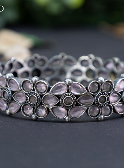 Oxidised floral design screw type bangle with baby pink stones