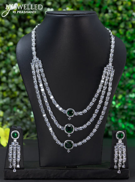 Zircon triple layer necklace with emerald and cz stones