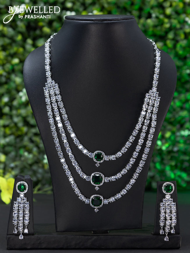 Zircon triple layer necklace with emerald and cz stones