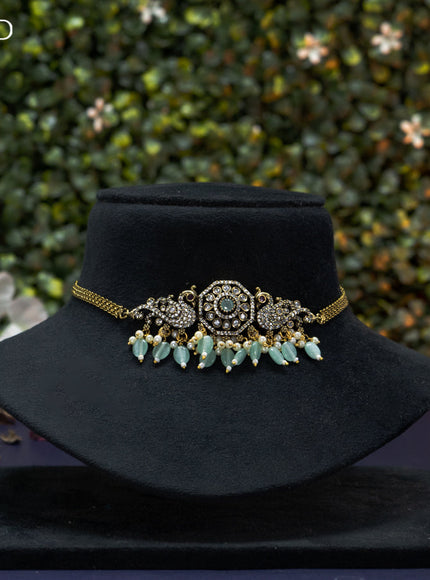 Choker peacock design with mint green & cz stones and beads hangings in victorian finish