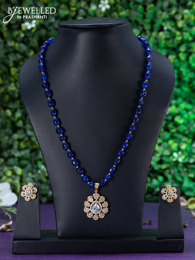 Beaded blue necklace with cz stones and floral pendant