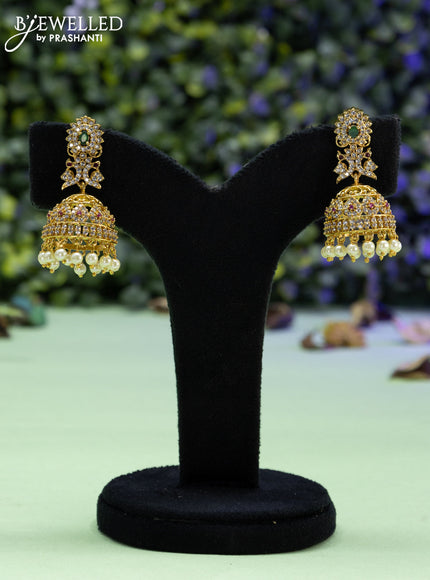 Antique jhumka peacock design with emerald & cz stones and pearl hangings