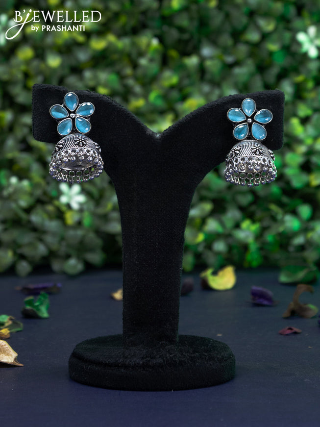 Oxidised jhumka floral design with light blue stones and hangings