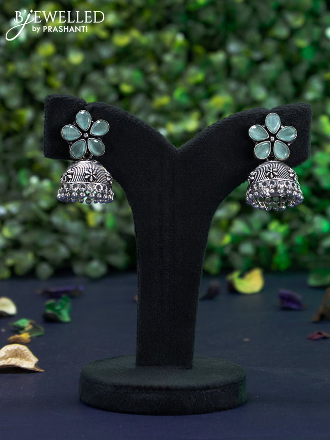 Oxidised jhumka floral design with ice blue stones and hangings