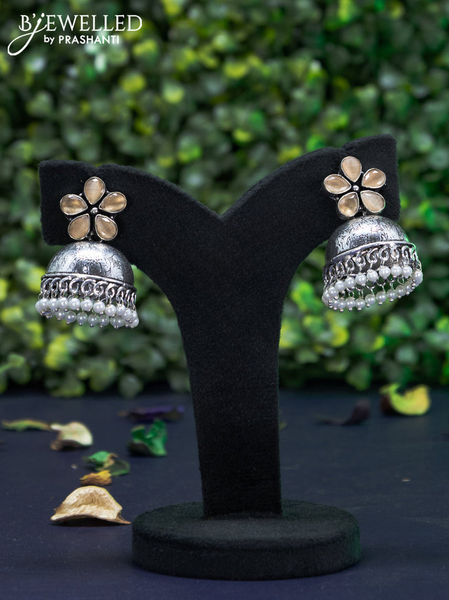 Oxidised jhumka floral design with sandal stones and pearl hangings