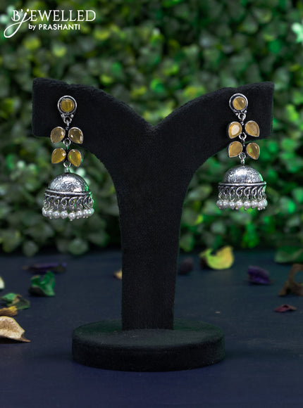 Oxidised jhumka with yellow stones and pearl hangings